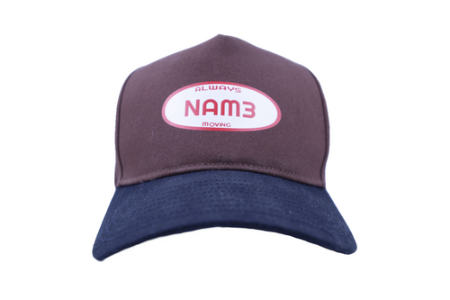 Cap with 'NAM3' logo on a white background